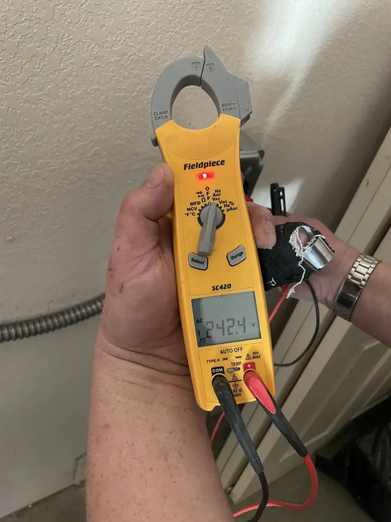 Voltage testing with clamp meter during Generator Installation in Laguna Woods